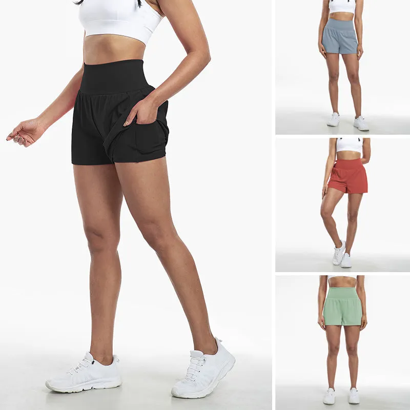 Højtaljede sportsshorts i falsk todelt design