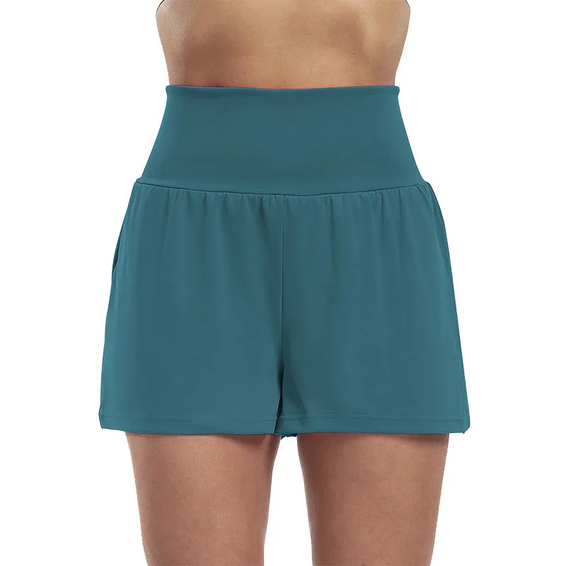 Højtaljede sportsshorts i falsk todelt design