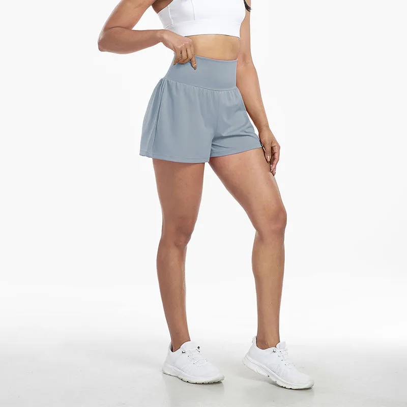Højtaljede sportsshorts i falsk todelt design