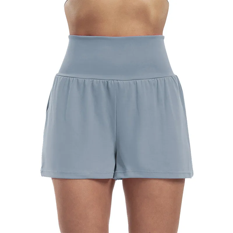 Højtaljede sportsshorts i falsk todelt design