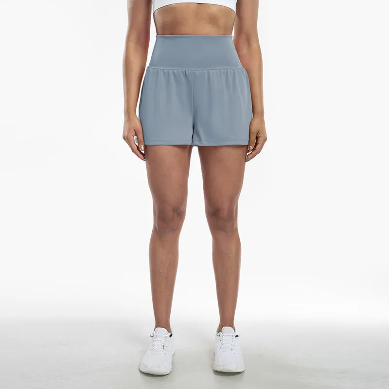 Højtaljede sportsshorts i falsk todelt design