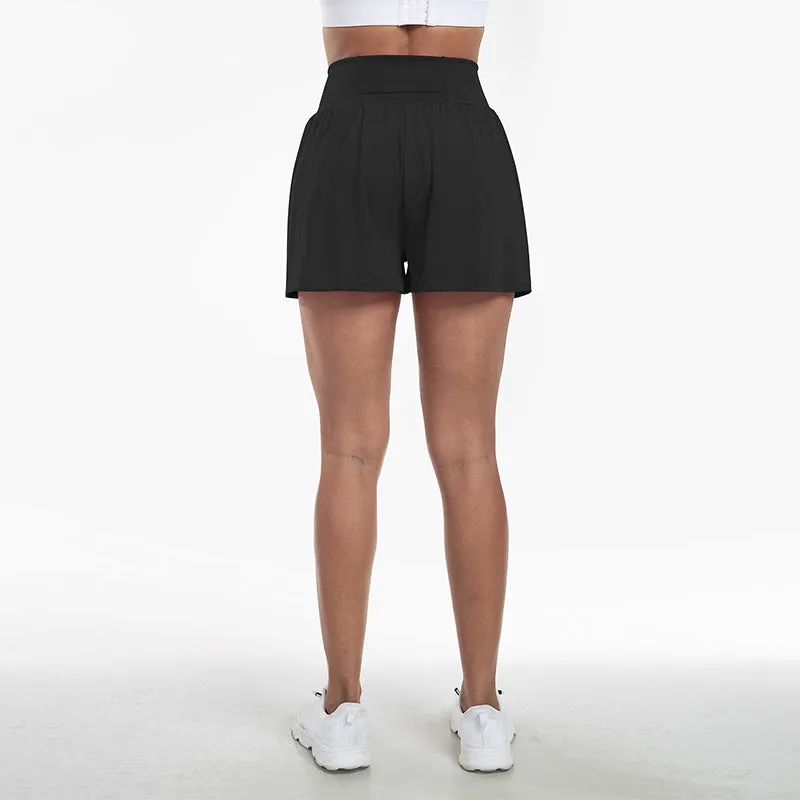 Højtaljede sportsshorts i falsk todelt design