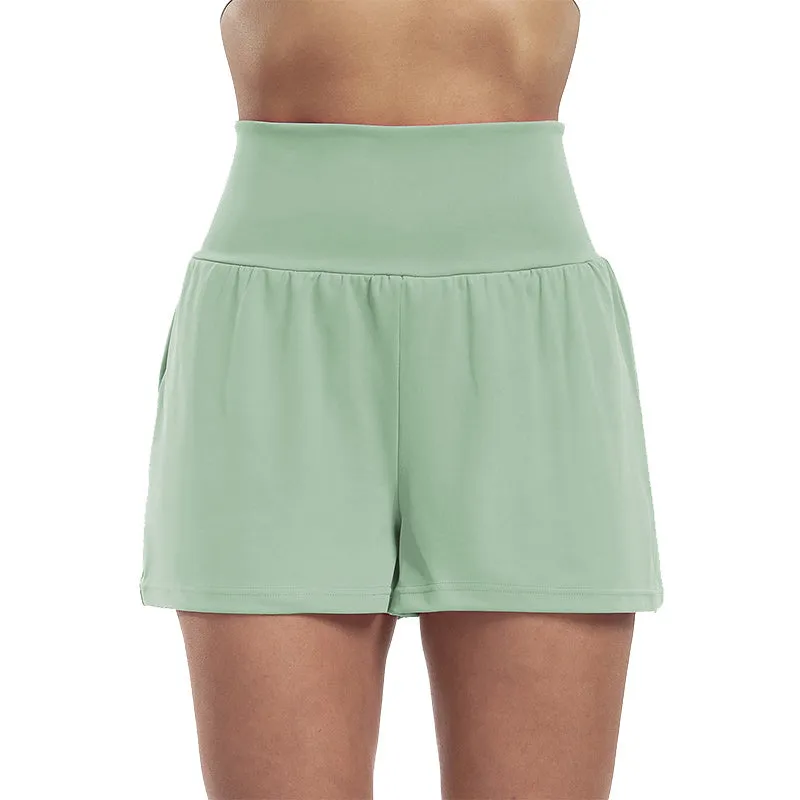 Højtaljede sportsshorts i falsk todelt design